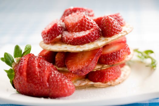 Plate served with toast and deliciously fresh strawberries