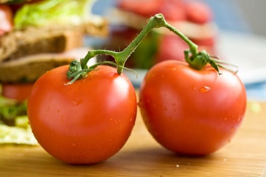 Two tasty tomatoes side by side