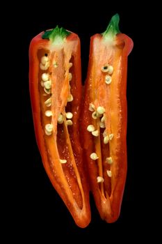 Chilli sliced and isolated on black