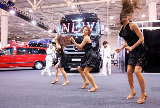 Models perform during a presentation at the 4th TIR-2008 show of freight and business-class vehicles in Kyiv on Tuesday, September 16, 2008.