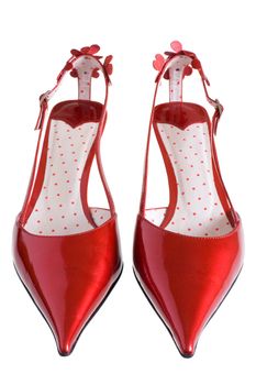 Red patent-leather shoes on a white background
