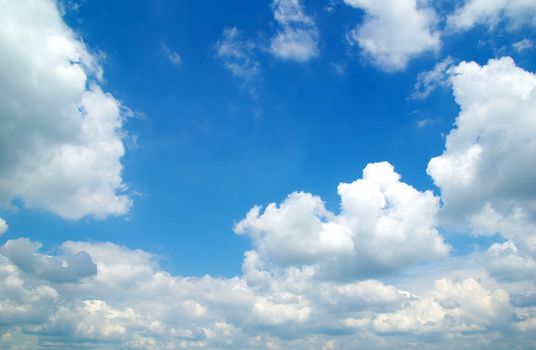 blue sky background with tiny clouds