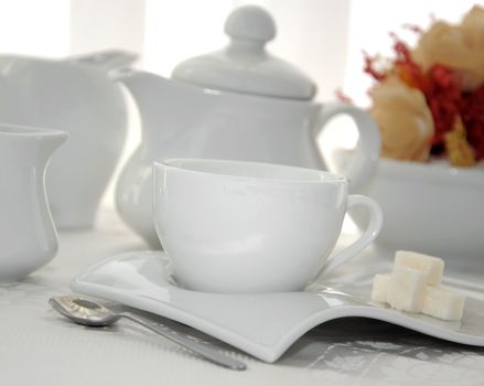 Midday cup of tea with sugar cubes