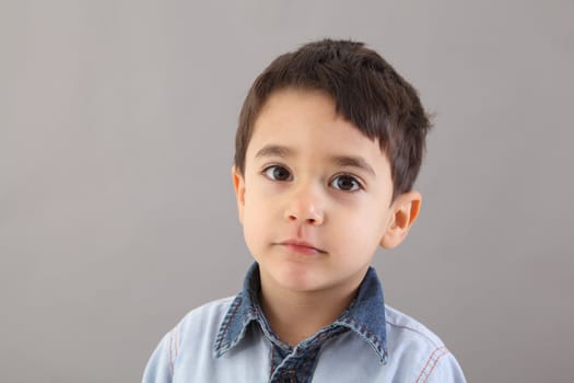 Child portrait isolated in studio