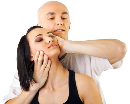 young woman receiving traditional neck thai massage by therapist