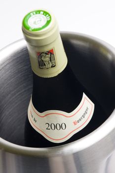 bottle of Burgundy wine in winecooler