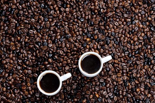 still life of coffee cups and coffee beans