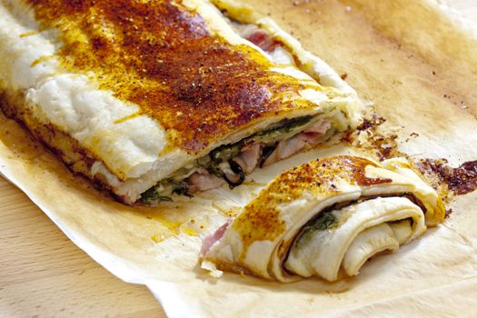 puff roly-poly filled with spinach and bacon