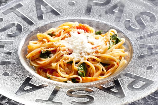 spaghetti with tomatoes, basil and parmesan