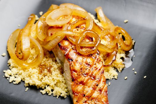 grilled salmon with burned onion and couscous