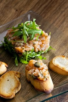 salmon tartar with ruccola