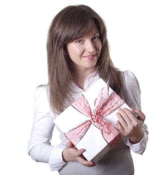 Young smiling woman holding gift - light box with a bow