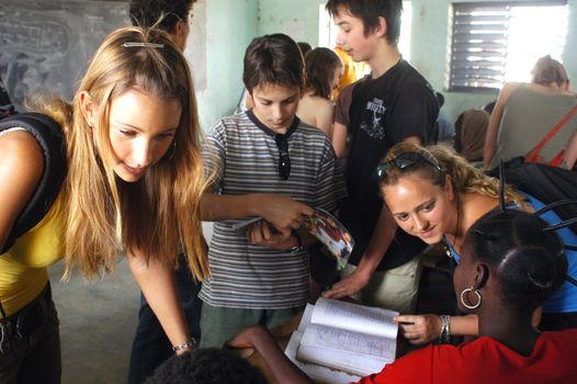 Visit French schoolboys in Burkina Faso Faso in a school of a village. Exchanges are done between the small French and the small Africans for better understanding the differences in life between them.