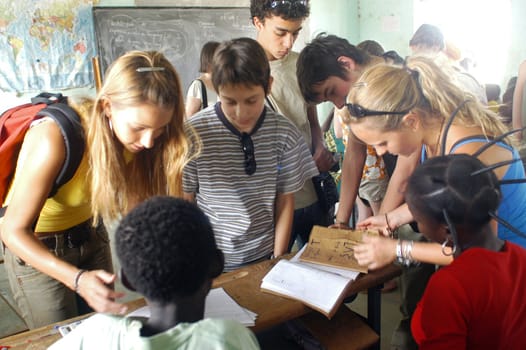Visit French schoolboys in Burkina Faso Faso in a school of a village. Exchanges are done between the small French and the small Africans for better understanding the differences in life between them.