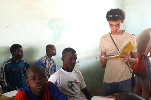 Visit French schoolboys in Burkina Faso Faso in a school of a village. Exchanges are done between the small French and the small Africans for better understanding the differences in life between them.