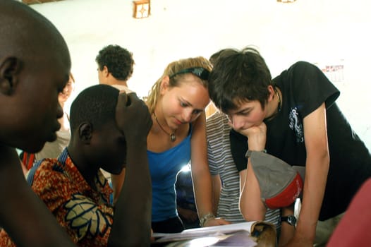 Visit French schoolboys in Burkina Faso Faso in a school of a village. Exchanges are done between the small French and the small Africans for better understanding the differences in life between them.