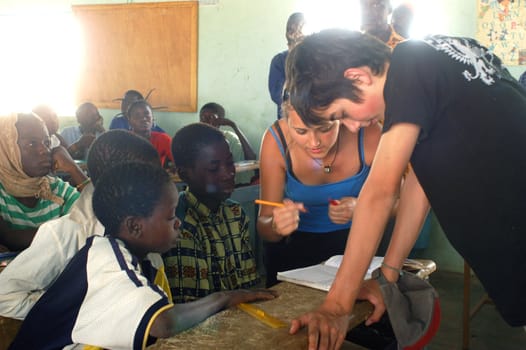 Visit French schoolboys in Burkina Faso Faso in a school of a village. Exchanges are done between the small French and the small Africans for better understanding the differences in life between them.