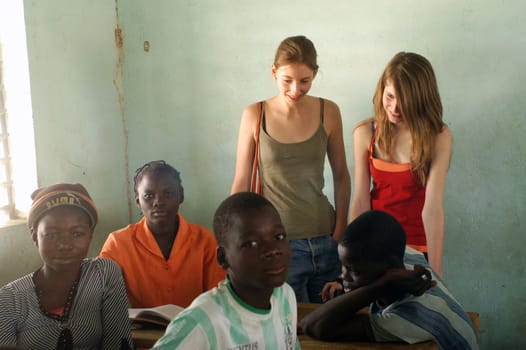 Visit French schoolboys in Burkina Faso Faso in a school of a village. Exchanges are done between the small French and the small Africans for better understanding the differences in life between them.