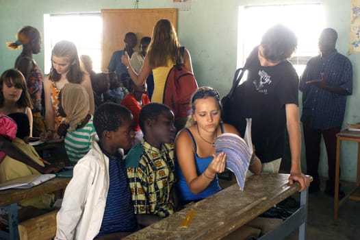 Visit French schoolboys in Burkina Faso Faso in a school of a village. Exchanges are done between the small French and the small Africans for better understanding the differences in life between them.