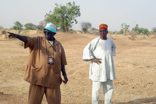 African waterfinder with work in an area of Burkina Faso Faso. Water is not rare in Africa, only it is necessary to drill wells to reach it. The waterfinder thus determines the place exact where to drill because drilling costs 8000 ? and it is not question of missing the place where the machines will have to work.