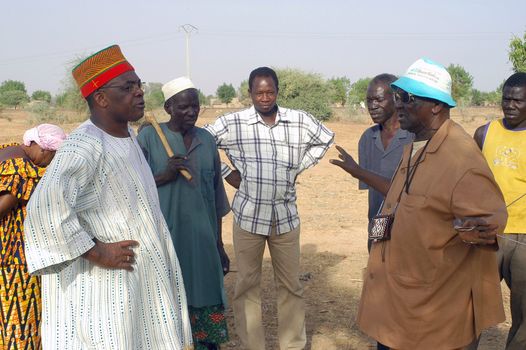 African waterfinder with work in an area of Burkina Faso Faso. Water is not rare in Africa, only it is necessary to drill wells to reach it. The waterfinder thus determines the place exact where to drill because drilling costs 8000 ? and it is not question of missing the place where the machines will have to work.