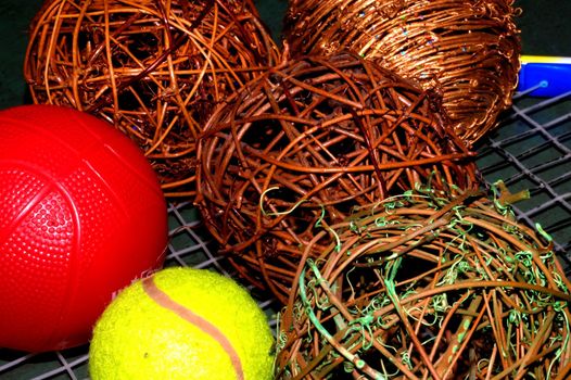 christmas decorations with tennis ball, toy basketball and tennis racket