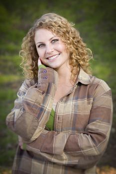 Pretty Young Smiling Woman Outdoor Portrait.