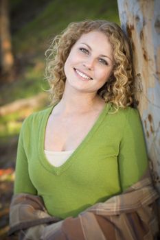 Pretty Young Smiling Woman Outdoor Portrait.