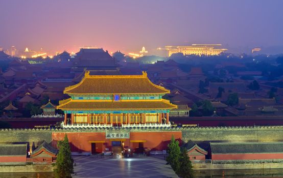 Picture of the night view of the Forbidden City in the fog