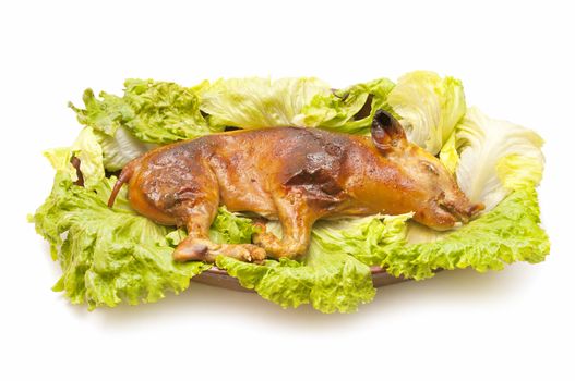 freshly roasted pig isolated on white background