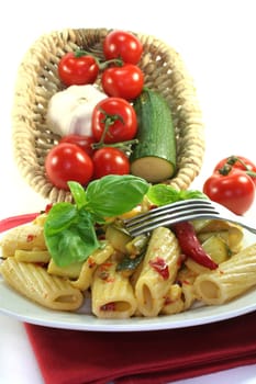 Noodles with fiery chili, garlic, zucchini and herbs