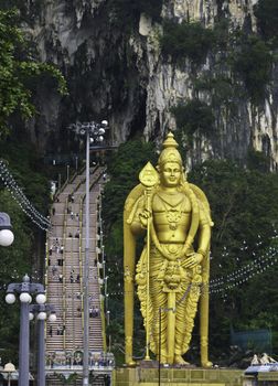 Golden statue in front of Batu caves in Kuala Lumpur, Malaysia