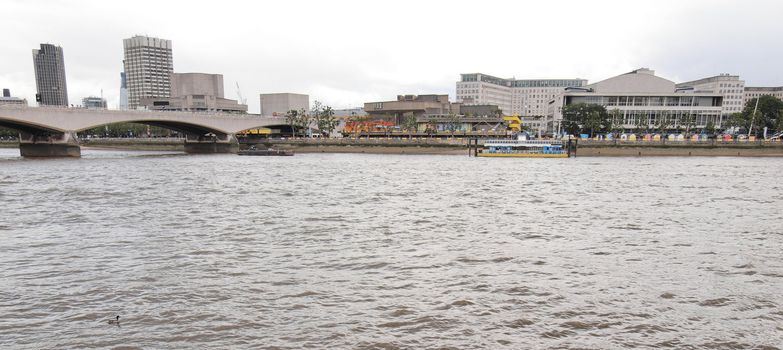 Wide angle panoramic view of River Thames South Bank in London UK