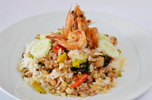 Shrimp and  minced pork fried with chili pepper and  sweet basil on rice