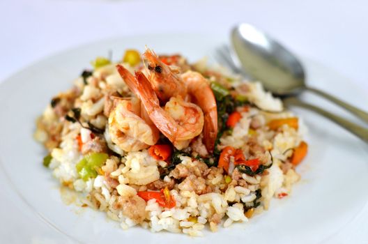 Shrimp and  minced pork fried with chili pepper and  sweet basil on rice