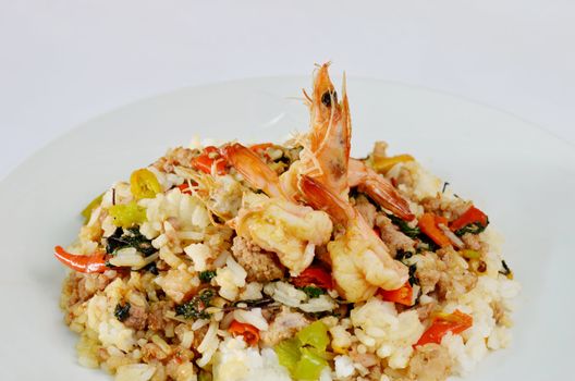 Shrimp and  minced pork fried with chili pepper and  sweet basil on rice