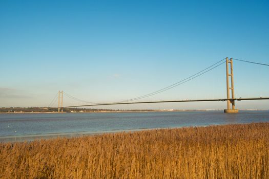A photo of the Humber bridge taken from the south bank of the river Humber UK