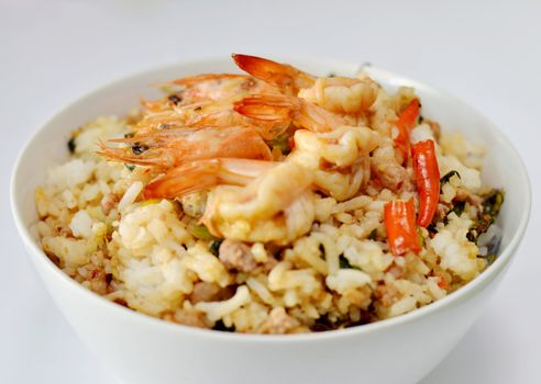 Shrimp and  minced pork fried with chili pepper and  sweet basil on rice