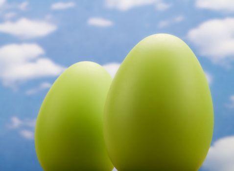 Easter eggs over a blue sky