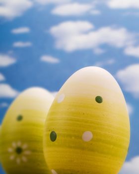 Easter eggs over a blue sky