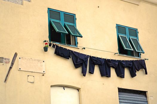 European windows with drying linen