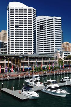 Modern harbour with skyscrapers and yachts