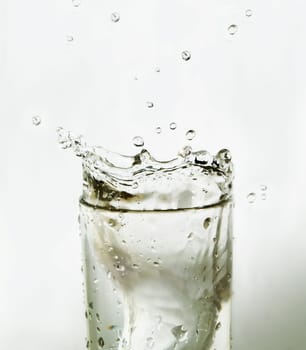 Sparks of water in a glass