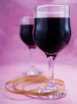 Two glasses of red wine in a party