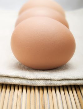 Three eggs in a kitchen