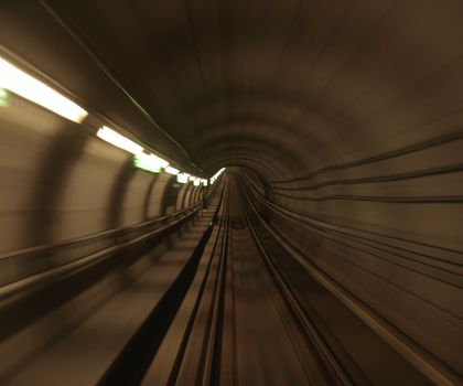 motion blurred metro rail tunnel