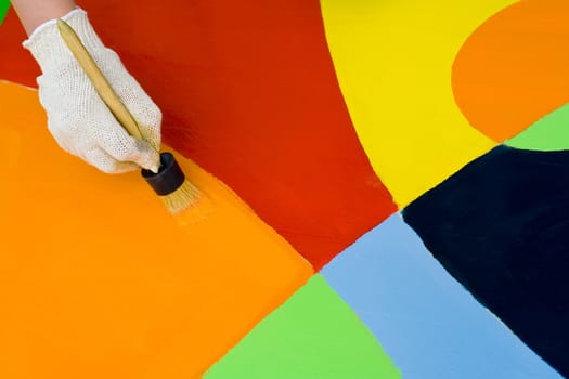 Colorful paint with a paintbrush