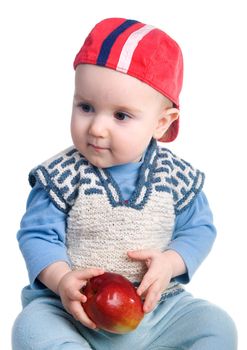 Study of  apple the by small boy, useful and tasty fruit