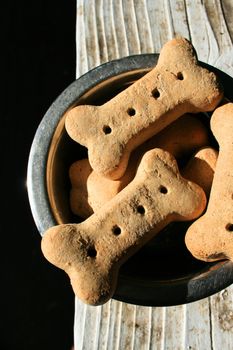 Close up of the dog cookies in a bowl.
