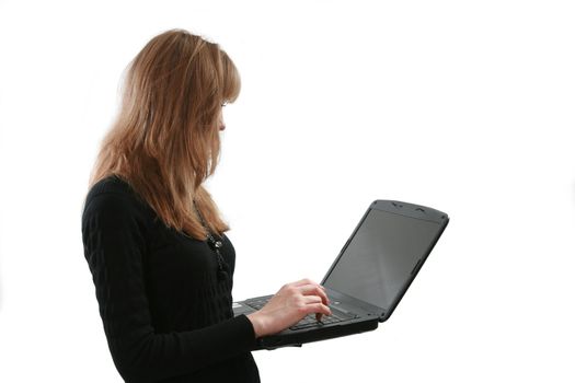 The young woman works with a computer